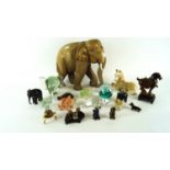 A quantity of figures of elephants and other items