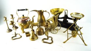 A collection of copper and brassware