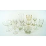 Two Toast masters glasses and assorted other glasses