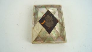 A mother of pearl and tortoiseshell card case