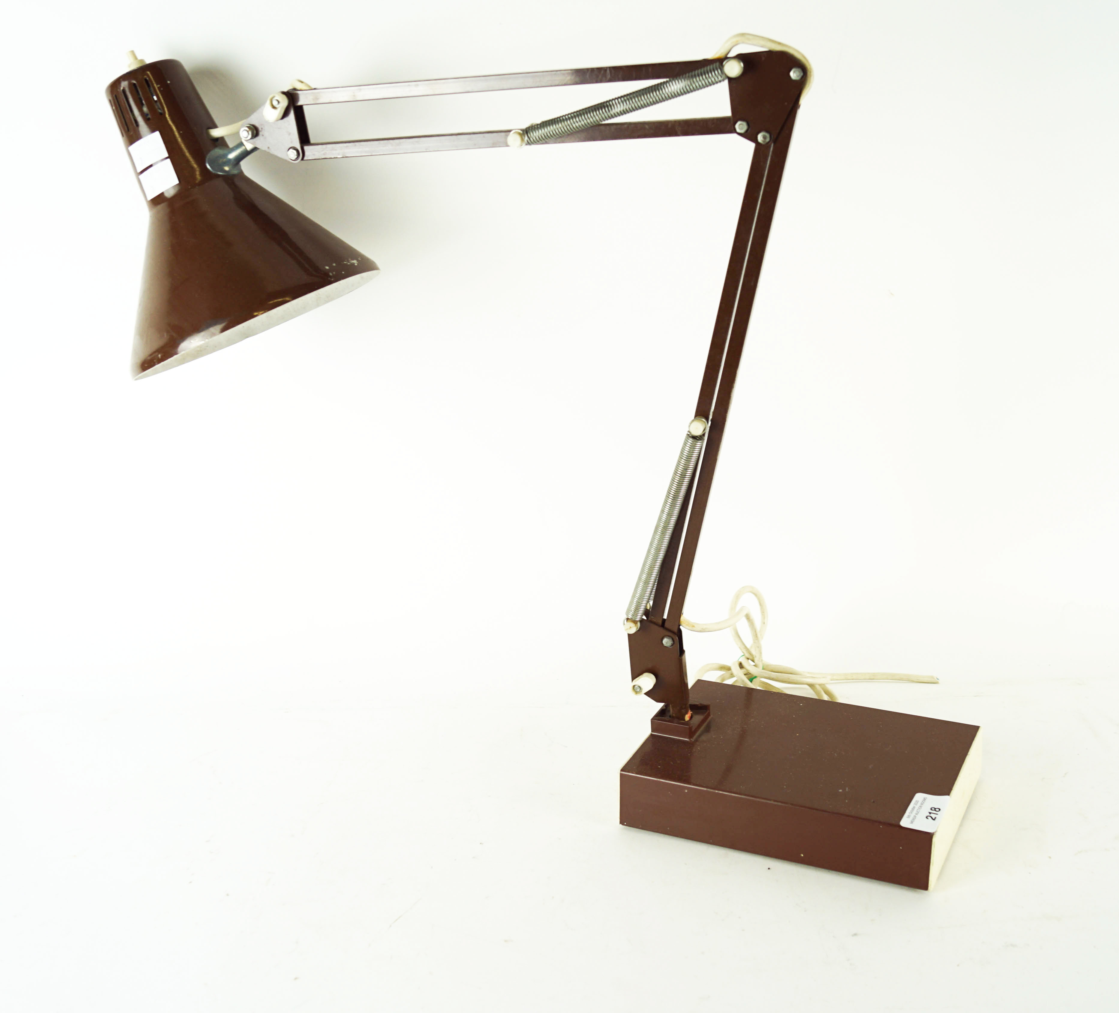 An electric current generator and an anglepoise lamp