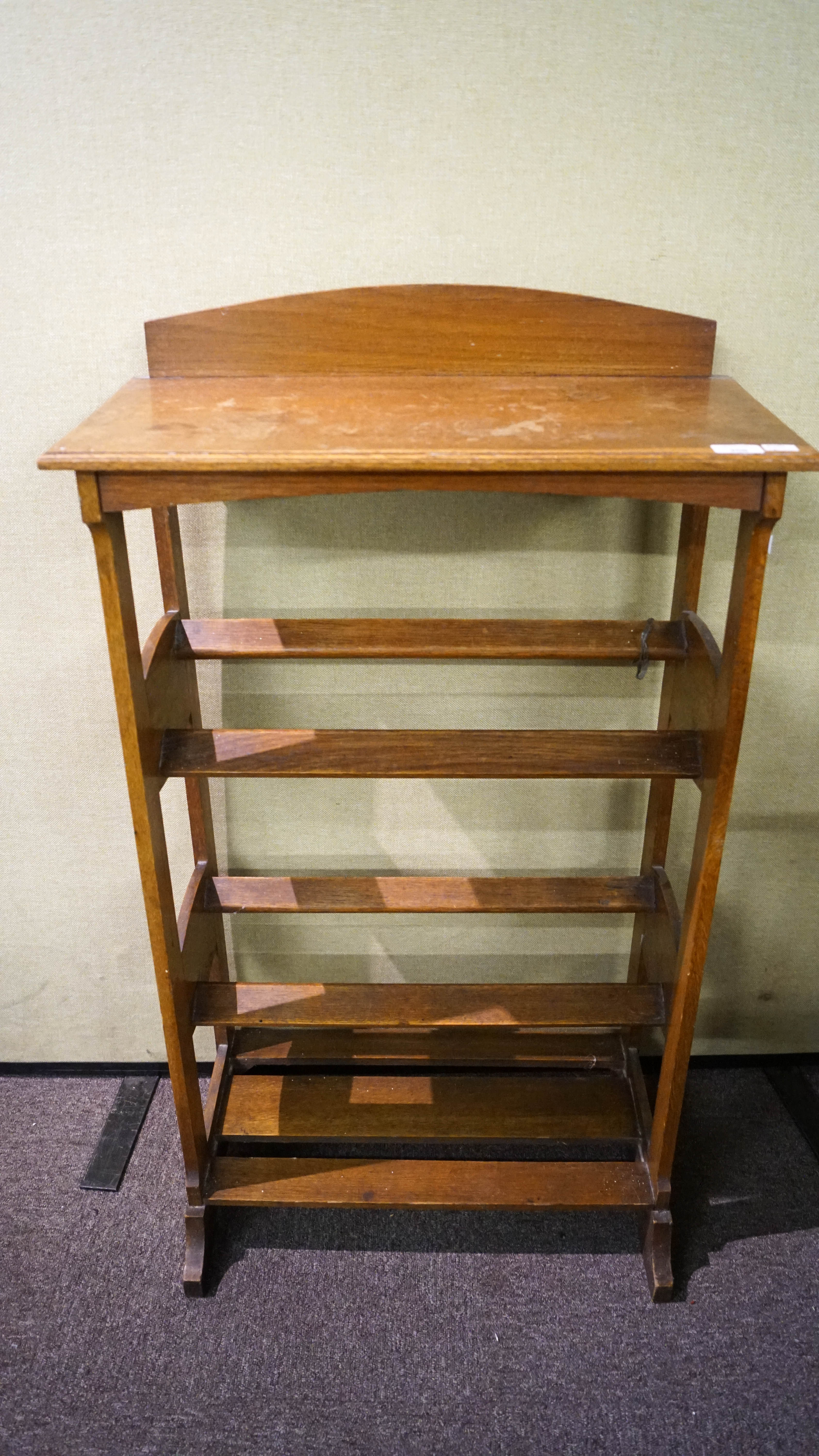 An oak shoe rack by G. Smeron & Sons Ltd