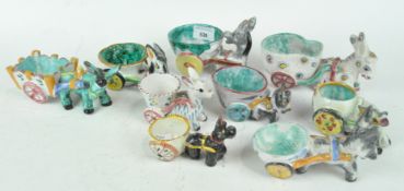 A collection of porcelain, to include a donkey and cart model,