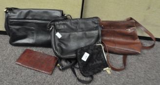 A group of handbags and purses