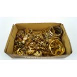 A box of gilt metal jewellery