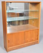 Herbert Gibbs, as 1960's retro vintage teak wood mirror backed display cabinet