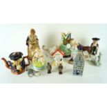 A collection of ceramic figure animals to include a Nao cat,