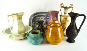 A wash bowl and jug and other vases