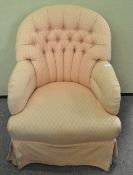 A 20th century tub shaped armchair with button back on tapering legs and modern casters,