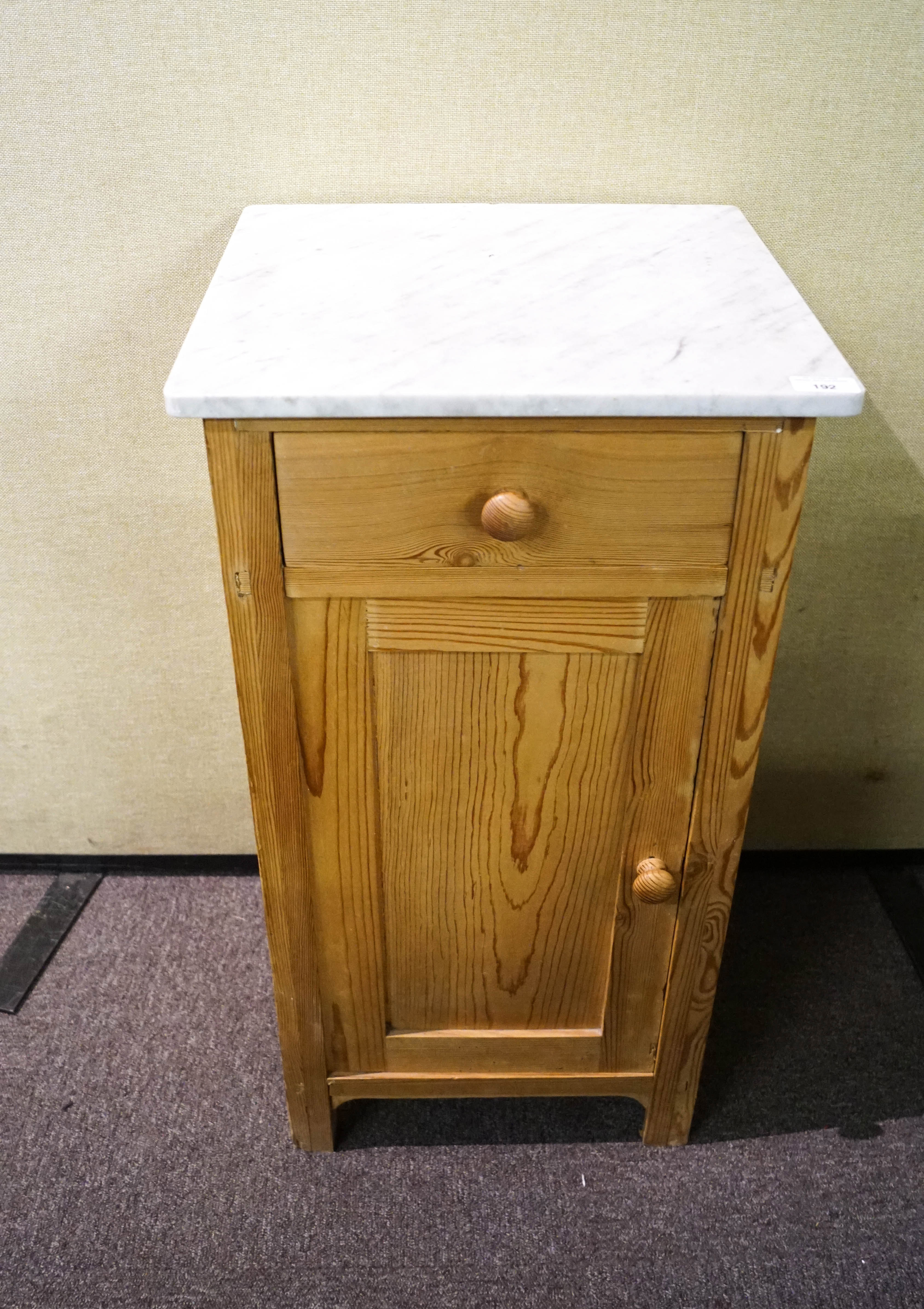 A marble topped pine pot cupboard with drawer to top