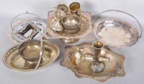A collection of assorted silver plated items to include; cake baskets, flower stand and other items.
