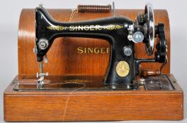 A Singer sewing machine in good travelling case