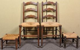 A pair of oak ladder back chairs along with stool, all having straw weaved seats.
