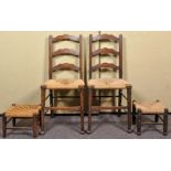 A pair of oak ladder back chairs along with stool, all having straw weaved seats.