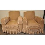 A pair of early 20th century upholstered club chairs.