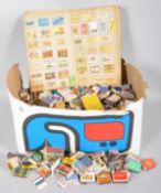 A large collection of assorted vintage Matchbox boxes and fronts from around the world