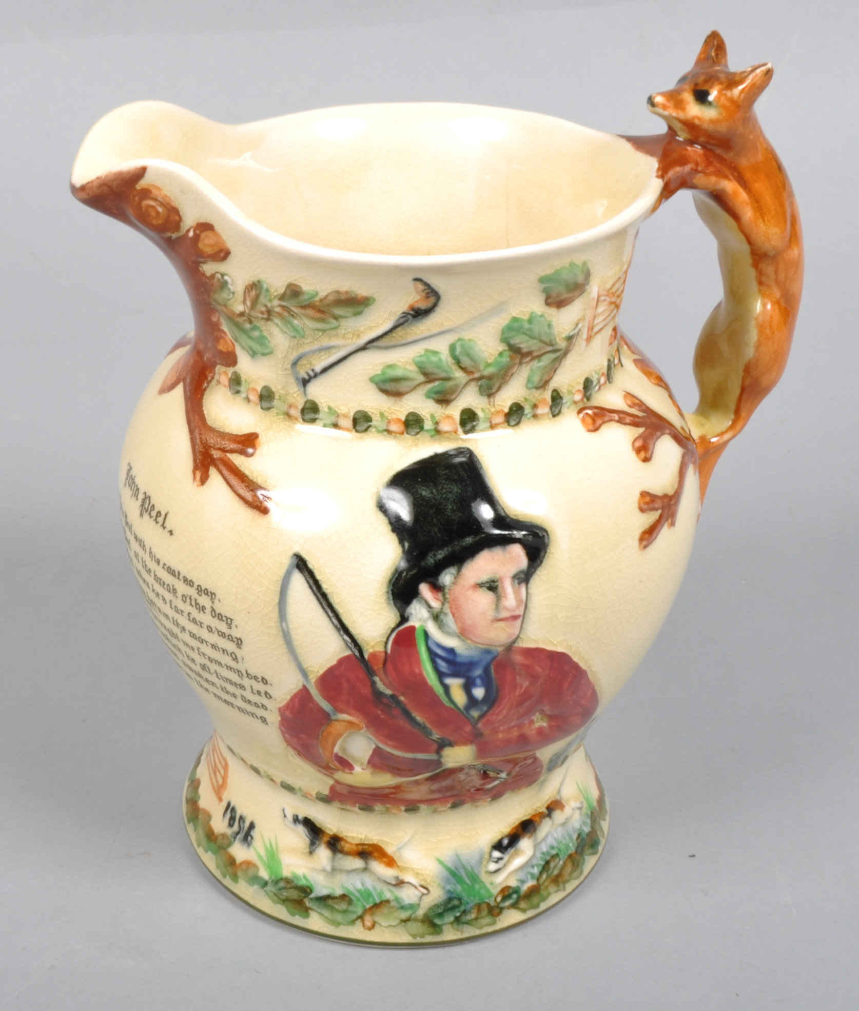 A Crown Devon Fielding's musical John Peel Hunting jug 19.5 cm.