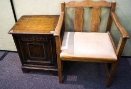 An oak carved coal purdonium and a wicker chair. Largest measure; 60cm high.