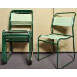 A set of six 1960's retro vintage tubular stacking chairs with canvas seats.
