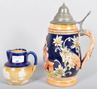 A stein and a Doulton style jug