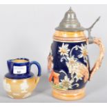 A stein and a Doulton style jug