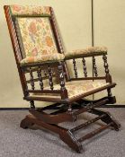 A 19th Century late Victorian American rocker/ rocking chair.