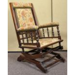 A 19th Century late Victorian American rocker/ rocking chair.