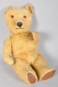 A late 20th Century golden mohair soft toy teddy bear with moving limbs. Measures; 35cm.