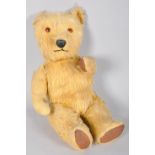 A late 20th Century golden mohair soft toy teddy bear with moving limbs. Measures; 35cm.