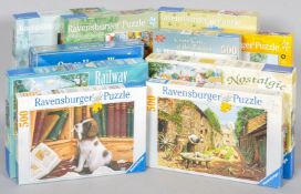 A collection of assorted boxed jigsaws