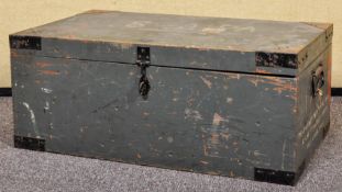 A 20th Century vintage wooden travelling trunk with partial western railways paper label to top