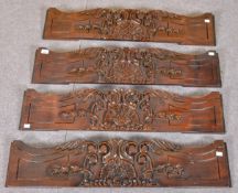 Four carved mahogany mouldings