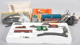 A Hornby OO Gauge model railway locomotive train set along with extra track.