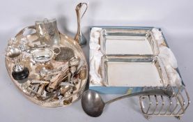 A collection of silver plate and stainless steel to include; a pierced oval tray, a toast rack,