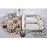 A collection of silver plate and stainless steel to include; a pierced oval tray, a toast rack,