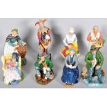 A collection of eight Royal Doulton figures