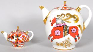 Two Russian gilt and painted ceramic teapots