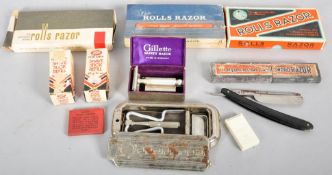 A collection of vintage boxed Rolls Razors and accessories.