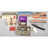 A collection of vintage boxed Rolls Razors and accessories.