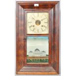 A 19th century mahogany American wall clock with a verre eglomise door. Measures; 65cm x 38cm.
