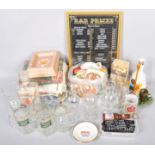 A collection of assorted of pub paraphernalia to include glasses, bar towels, ashtray, beer mats,
