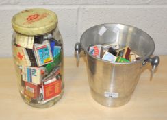 A collection of assorted matchbox boxes, some with matches still present.