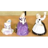 A set of three Royal Doulton ladies