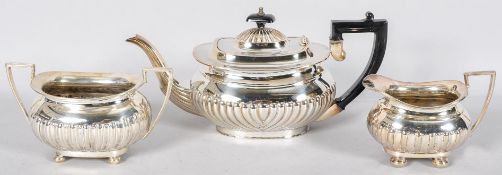 A three piece silver plated tea set
