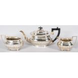 A three piece silver plated tea set