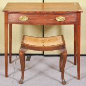 A mahogany ladies desk with single drawer raised on tapering legs with an oak cane work stool.