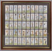 A framed collection of Churchman's cigarette cards depicting golfers