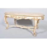 A Louis XV style parcel-gilt carved wood and marble oval sofa table, 20th century,