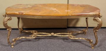A 20th Century Louis XV style brass and onyx coffee table. Measures; 44cm x 113cm x 55cm.