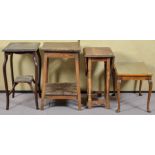 A drop leaf table together with three others. Largest measures; 70cm high.